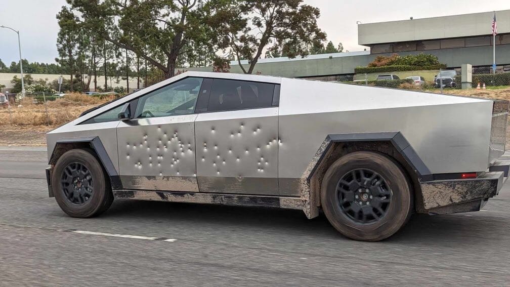 Bulletproof Brilliance: Tesla Cybertruck Faces the Tommy Gun Test.